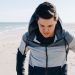 Man on a Beach in a Sweatshirt